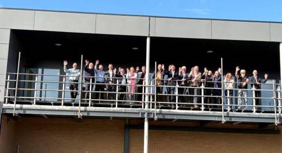 Members of Crewe Town Board on the balcony at the redeveloped Cumberland Arena